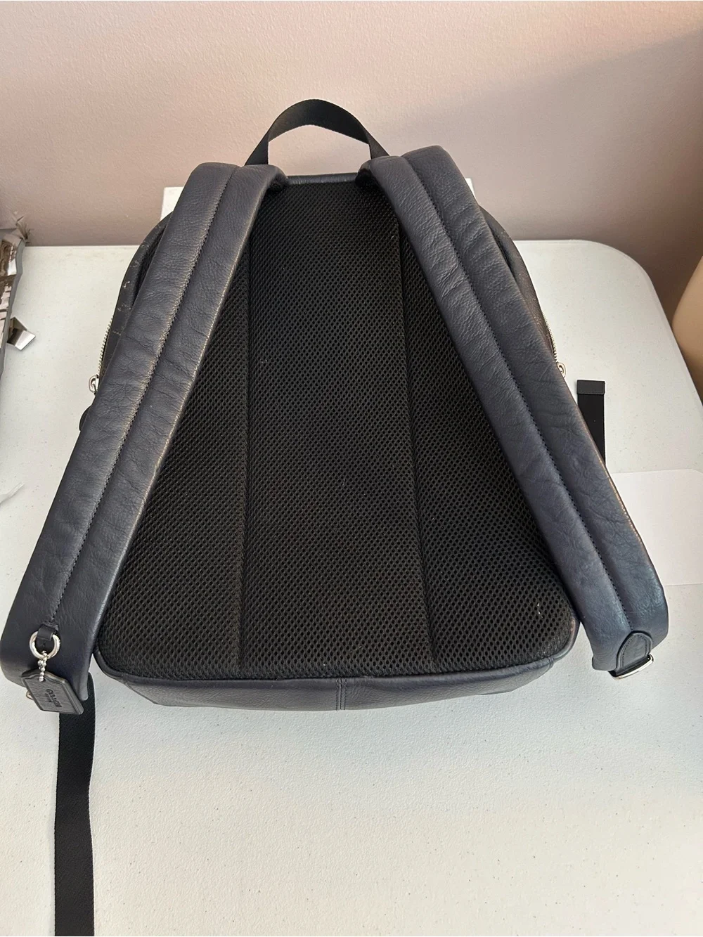 Coach Men's navy Backpack with tan/gold Logo Print